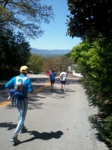The gentleman in the striped pants ran with a woman dressed the same but with a ducy on her hat