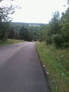Mile 4.34 about .2 miles up a hill that goes about .6 miles