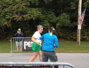 Me in the white and green handing off the slap bracelet to Meredith